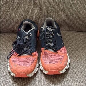 On Running Coral and Black Athletic Shoes